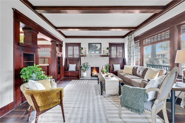 Living room and fire place with historic  built-in benches