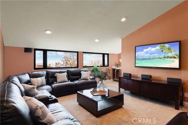 Family room with wet bar and sweeping view