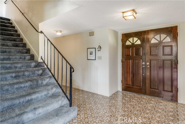 Foyer and stairs leading to second level