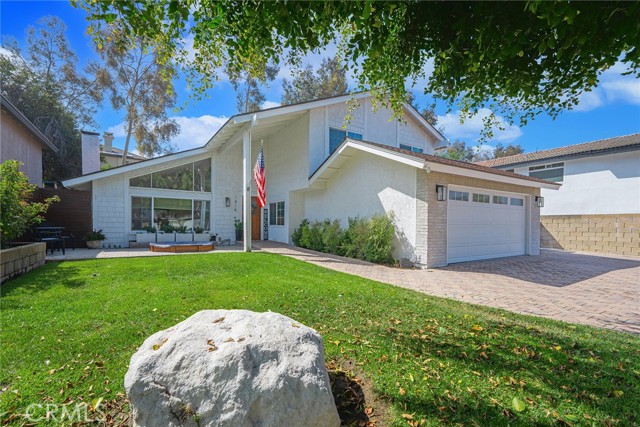 Gorgeous, updated and MOVE-IN-READY 4-bedroom, 3-bathroom Fullerton home located in a highly desired community in Fullerton. This home features an open living room and dining room, newer flooring throughout, and a completely renovated kitchen that leads to the family room and entertainers backyard complete with outdoor built-in BBQ area, and spacious covered patio making this a great place to gather and entertain. The completely redone pool along with spacious baja shelf & jacuzzi make those warm summer days and nights relaxing. Head upstairs to find the Primary Suite and oversized Primary Ensuite, with 3 more secondary bedrooms, and fully remodeled baths. This home has much to offer! And space to grow. There is also a full studio created with electricity and water and currently set up as a hair salon. This could make a fantastic office area for several individuals. Enjoy your huge front yard and remodeled backyard with space and room for whatever your heart desires; whether entertaining, relaxing, it’s the perfect place to be. The large tree in front plays host to a large tree house. Additional benefits of the home is the community; walk to the newly remodeled Craig Park; abundant walking trails in the Fullerton Loop, Brea Mall, some of the best shopping and dining choices galore, AWARD winning schools, Coyote Hills Golf Course, 57 freeway and Cal State Fullerton! Also, Rolling Hills park is steps away from your front door. Location! Location! Location! At its best. Another added bonus is NO HOA!