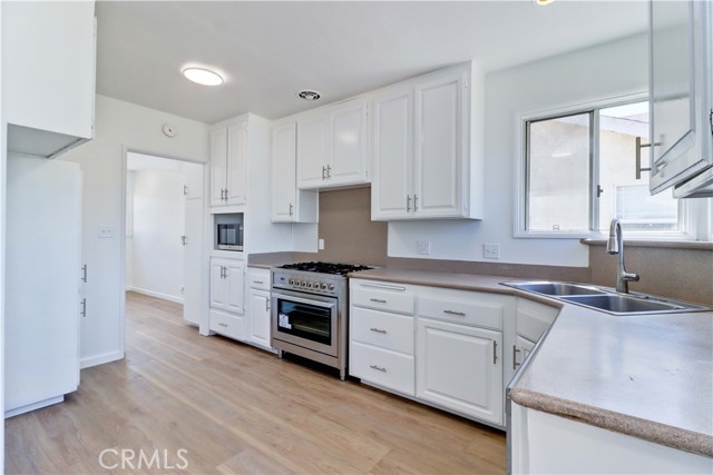 Detail Gallery Image 15 of 63 For 7515 Glencliff Dr, Downey,  CA 90240 - 4 Beds | 2/1 Baths