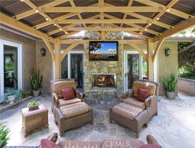 Outdoor seating area with fireplace