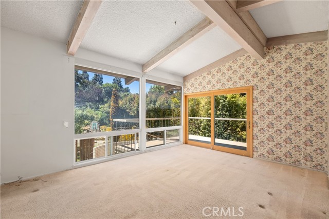 Dining room. Sliding doors to balcony over looking back yard.