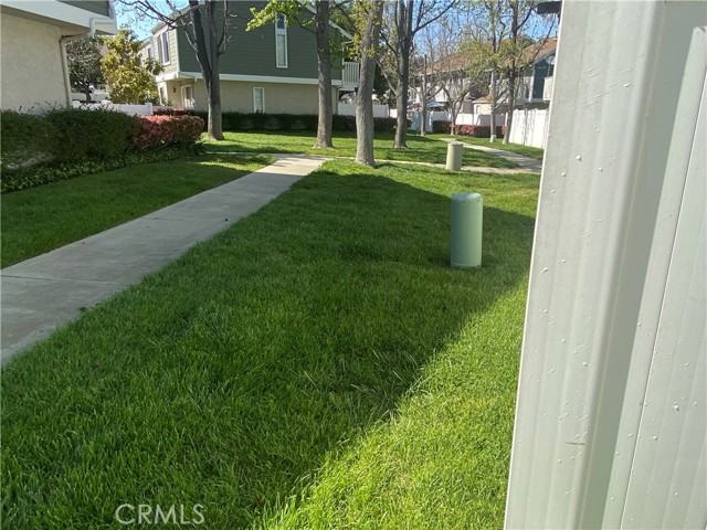 Open grass area behind the patio