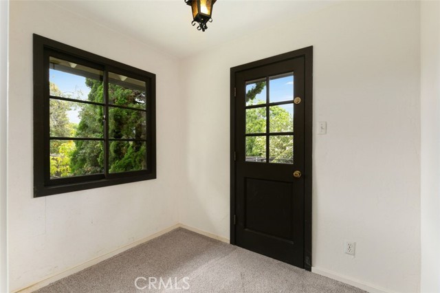 The Master bedroom office space opens out to the back garden.