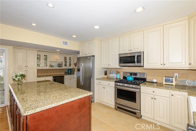 Remodeled kitchen with island & buffet/pantry. Remodeled kitchen with island & buffet/pantry.