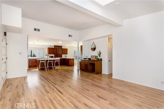 Newly refinished wood floors in the family room, kitchen and breakfast room.