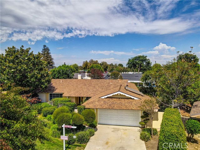 This Very Large Single Story Ranch style home (2,800+Sq. Ft.) with an open floor plan is located on a quiet cut-de-sac in one of Fullerton’s best neighborhoods the Acacia Woods Development. It is within the attendance boundary of Troy High School. It is walking distance to award-winning schools : Acacia Elementary, St. Juliana Falconieri School, Rosary H.S. Academy, Cal State University Fullerton, and of course Troy High School. It has a large designated Dining Room with a Bavarian Crystal Chandelier over the dining room table, a very large and elegant Living room perfect for entertaining guests or family get togethers, and 2 fireplaces, one with a marble hearth. Very large Primary bedroom with its own dressing area along with a sink, vanity, an additional closet, and the bathroom has a walk-in enclosed shower. This bedroom has additional storage space in very large closets. A laundry room is just off of the Kitchen. There is Oak flooring beneath a lot of the carpet as well as copper plumbing running through the home. Also there is a large 2  car Garage, 240 square foot Glass enclosed Solarium, a 3 Tiered Fountain in a beautiful alcove surrounded by its own Camellia Garden. The backyard has an Amish Country Gazebo from Pennsylvania with a multi-tiered Pagoda style roof along with its own ceiling fan, a perfect place to spend the afternoons reading or chatting with friends. There is easy freeway access to the 57 Freeway, the 91 freeway and the 5 Freeway. The Brea Mall , Local downtown dining and entertainment, ,and train station are all within short driving distances. There is much more. First time offered since it was built. Call your agent and come and see this beautiful home before it is gone.