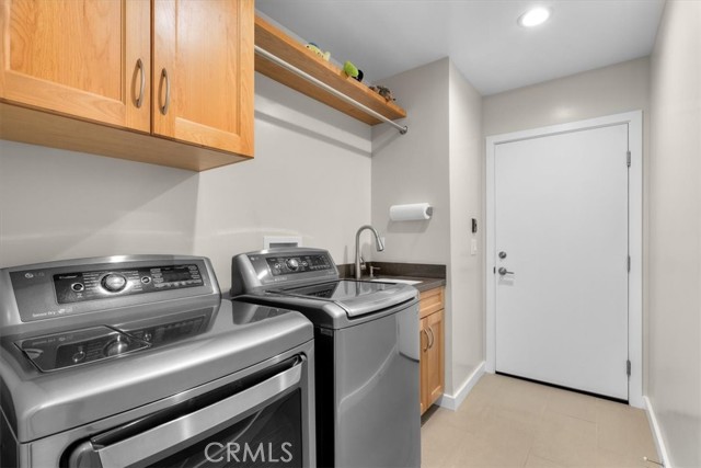 Dedicated laundry room with direct access to garage.