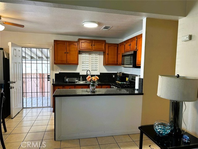 150 E 95th Street, Los Angeles CA: https://media.crmls.org/medias/e90c0b84-ecec-4a7b-a937-18d690d755b7.jpg