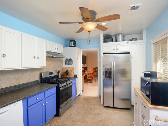 Cheerful kitchen with ceiling fan (and frig included with main home)