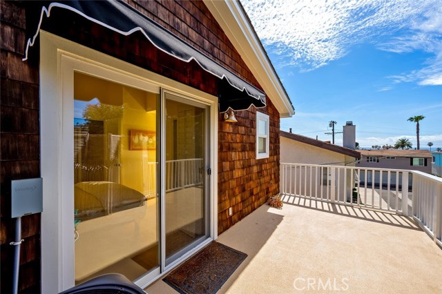 3rd bedroom balcony with peekaboo ocean view.