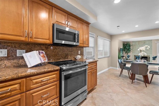 Large dining area adjacent to kitchen.