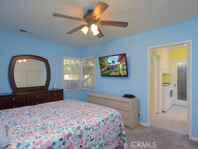 Master with adjoining master bath and numerous closets and storage