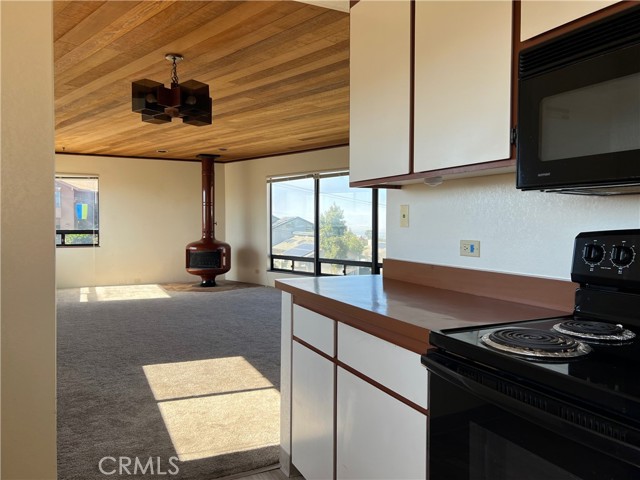 KITCHEN TOWARDS LIVING ROOM