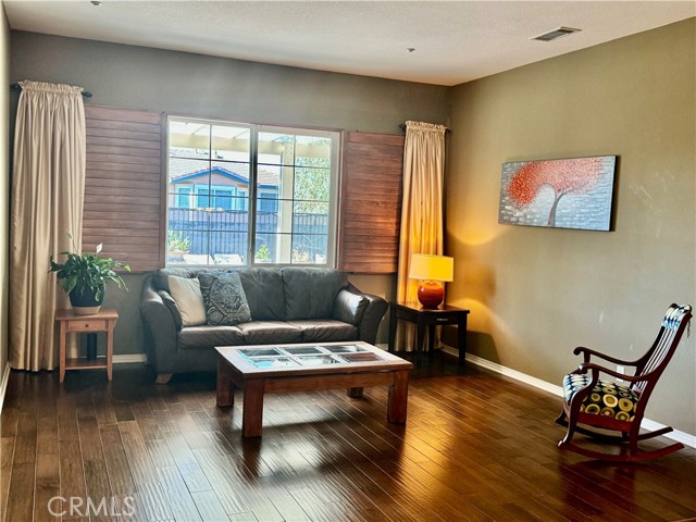 Formal Living room connected to formal dining area.