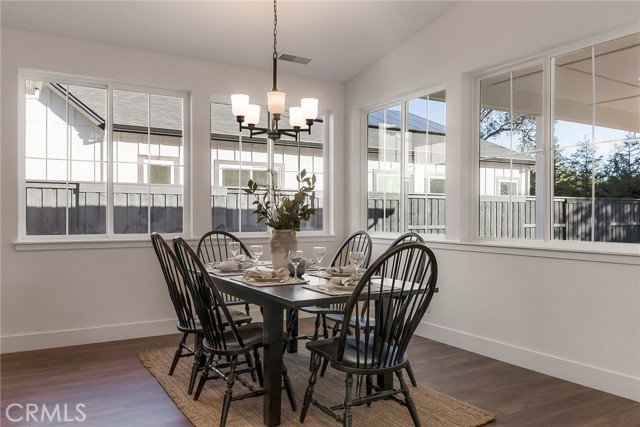So much light in the dining area with all the widows