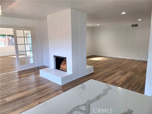 view of living room and dining room from the kitchen