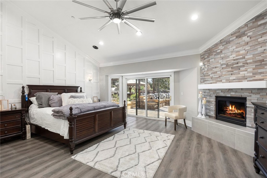 Primary Suite, with Stone fireplace with raised hearth