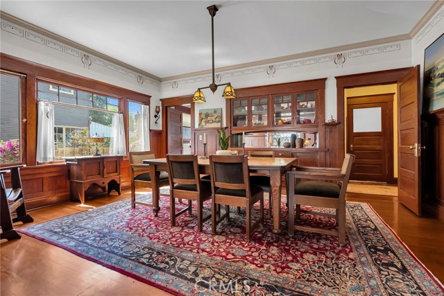 Dining room with glass front buffet.