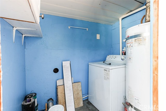 laundry room w water heater