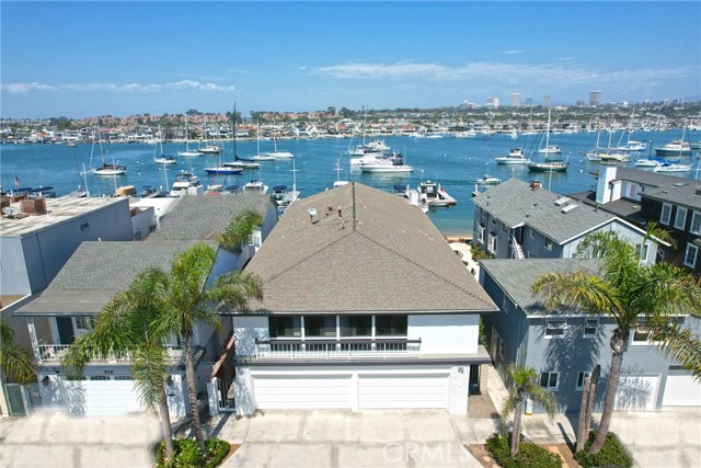 A rare opportunity to obtain a lifestyle others dream of. Set on a premiere waterfront lot this spectacular over sized 6,565 sq ft lot with pool offering 45 feet of frontage hosts a private dock accommodating a vessel up to 70 feet as well as a second boat up to 50 feet. Boasting approximately 5,200 square feet, the accommodations comprise of five large bedrooms, five bathrooms, including the over sized primary bedroom with awe-inspiring bay, and city light views. This pool home can not be duplicated making it the perfect setting to either build your dream home or remodel keeping the oversized 4 car garage with parking for 8 cars!