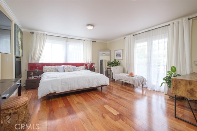 bedroom 1-primary w fireplace and balcomy