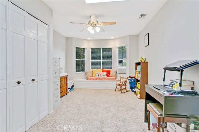 Cozy sitting area at Bay Window overlooks the beautiful garden at the front yard.