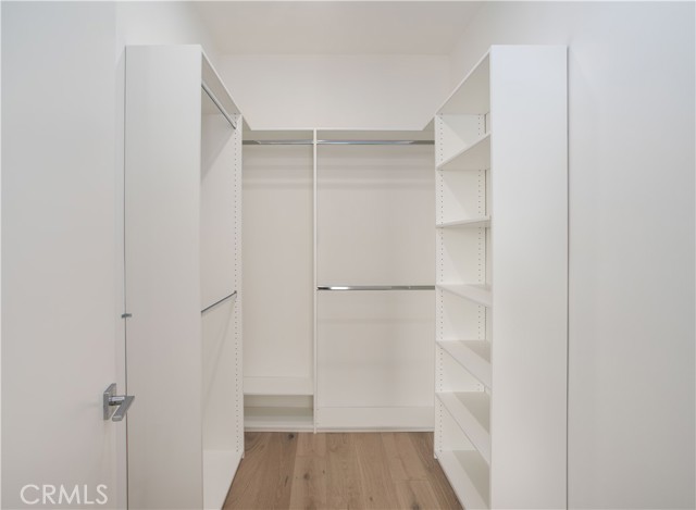 Primary Bedroom with walk-in closet