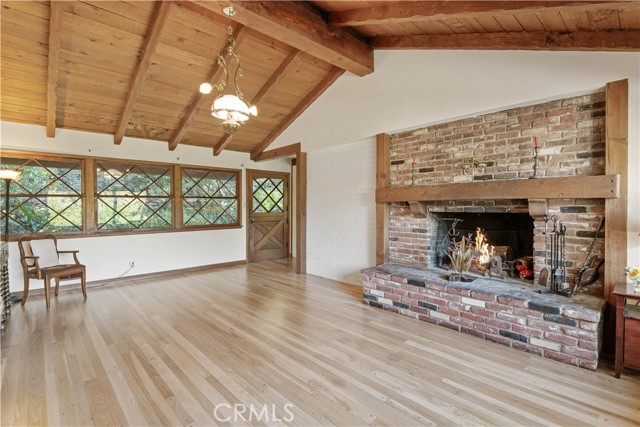 Great room to backyard.  Photographer inserted fire for this photo.