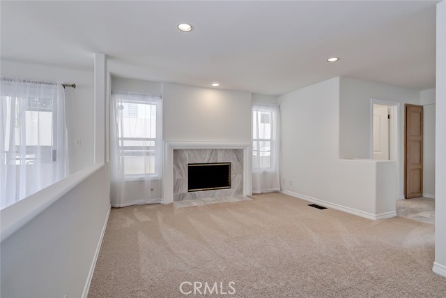 Gas fireplace adds warmth to the formal living space