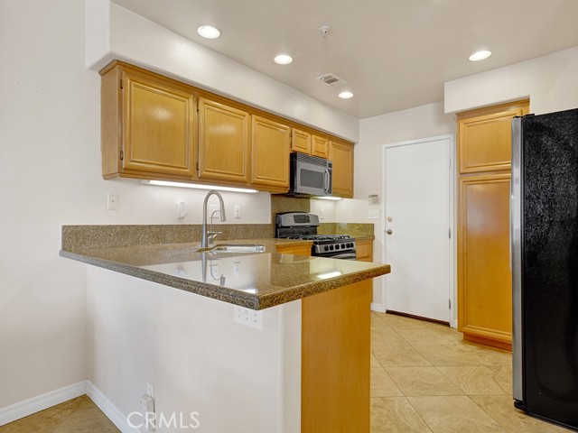 Detail Gallery Image 6 of 27 For 2347 Sunningdale Dr, Tustin,  CA 92782 - 2 Beds | 2/1 Baths