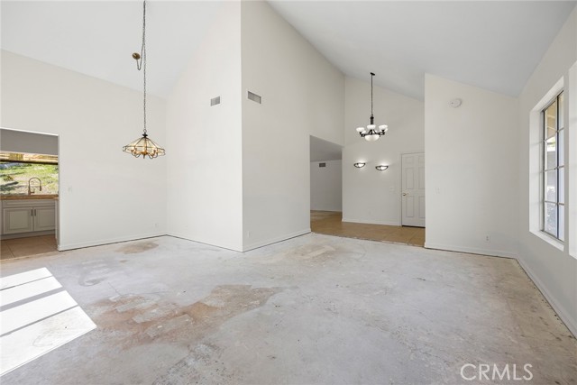 Dining and Living Room with Vaulted Ceilings
