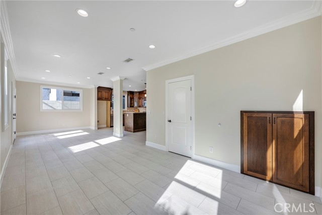 White door on right is a half bath & stained doors are under stairs storage.