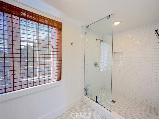 Bright and spacious walk-in shower.