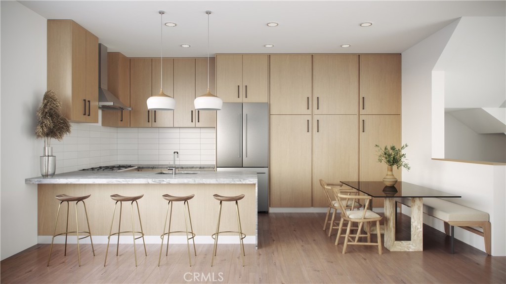 Kitchen and dining areas. All renderings are conceptual only. Subject to change.