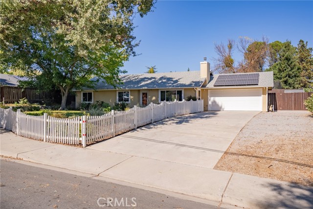 The driveway provides plenty of room for visitors! Plus there is room to park an RV or trailer!