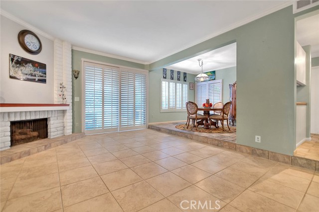 Another View Of Dining Room From Living Room.  All Windows & Doors Have Wood Shutters!