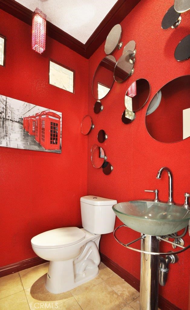 Adorable Red Powder Bath off of Kitchen.