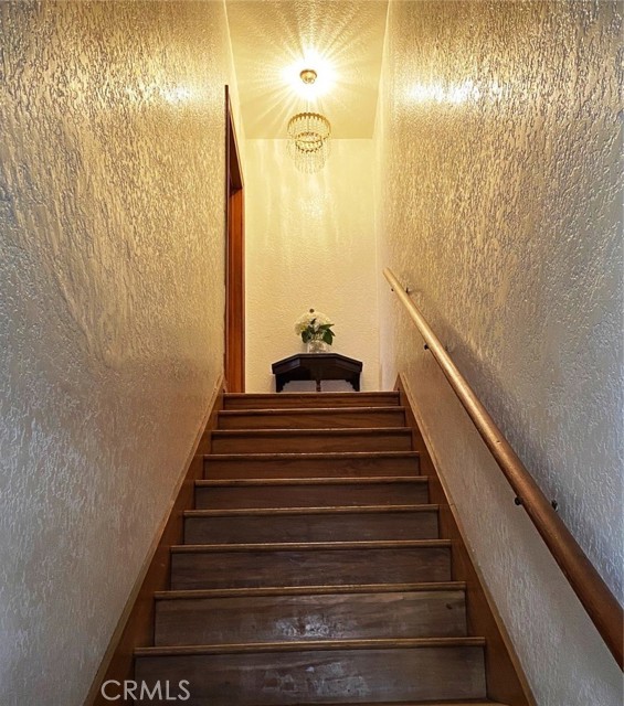 
staircase to the upstairs front units taken by the owners