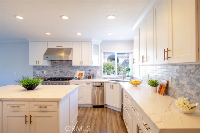 Updated kitchen with Stainless appliances, awesome countertops, and cabinetry