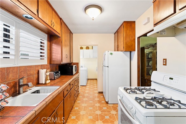 Kitchen leading to Laundry Room