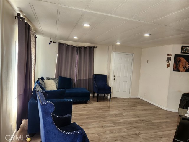 Living room wall divides 1st bedroom