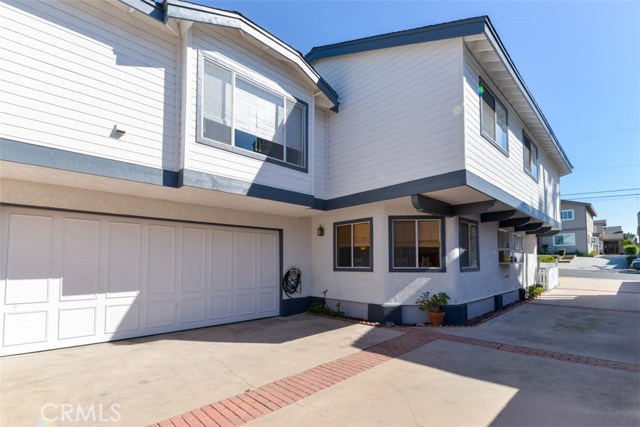 View of the attached two-car garage and driveway.