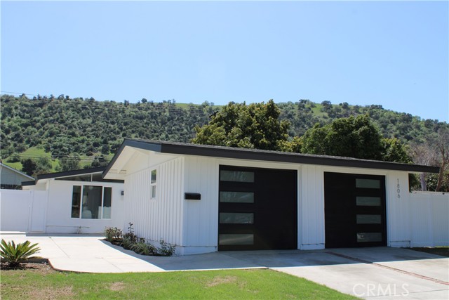 1806 Wright Street Pomona, California This modern California Ranch designed by Cliff May has been restored to reflect its original charm. The open floorplan is inviting and brings the outdoors in. New features include: roof, cabinets, flooring, paint, windows, doors, appliances, tile, vanities, lighting and garage doors. Unpack and enjoy.