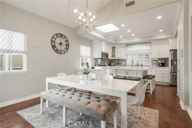 Large Dining Room Open on to Kitchen