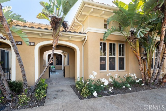 120 Chantilly Irvine, California Beautiful and highly upgraded 3 Bedroom/3 Bathroom Attached Home in Irvine's upscale neighborhood of Woodbury. Enter through a private gated entrance, high arches, and tree-lined walkway. Enjoy outdoor patio seating area perfect for relaxing in the warm weather and fresh air. Gourmet kitchen boasts granite counter tops, stainless steel appliances, 6 burner stove, and built-in range. Dine in kitchen or breakfast bar seating space. Spacious living room features cozy fireplace, gorgeous hardwood floors, and recessed lighting. Master bedroom suite is a getaway accompanied by large walk-in closet and spa-like master bath. Separate soaking tub, walk-in shower, and dual sinks offer plenty of space. Additional bedrooms include lush carpeting, designer wallpaper, and installed ceilings fans. Individual laundry room is conveniently located upstairs. Attached two car garage features direct access to home and built-in storage cabinets. Take advantage of community amenities including Olympic swimming pools, clubhouse, sport courts, and BBQ/picnic areas. Located nearby Irvine Spectrum center, entertainment, shopping, and grocery stores within walking distance. Home is within award-winning Irvine Unified School District. Minutes away from John Wayne Airport, freeway access, and coastal beaches!