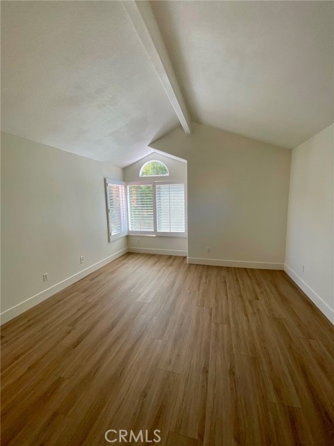 Primary bedroom faces back yard