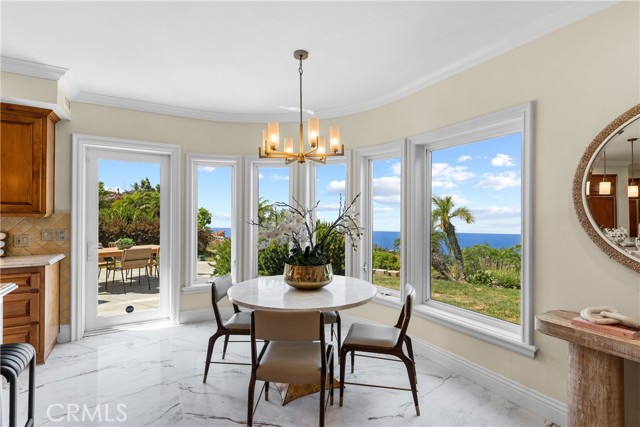 Breakfast area in kitchen, with ocean view.