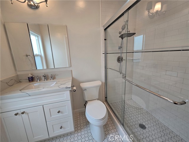 Wonderful primary bathroom with beautiful tile and spacious shower.